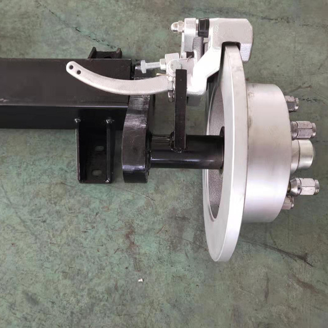 Eje de torsi&oacute;n del remolque con freno hidr&aacute;ulico de disco